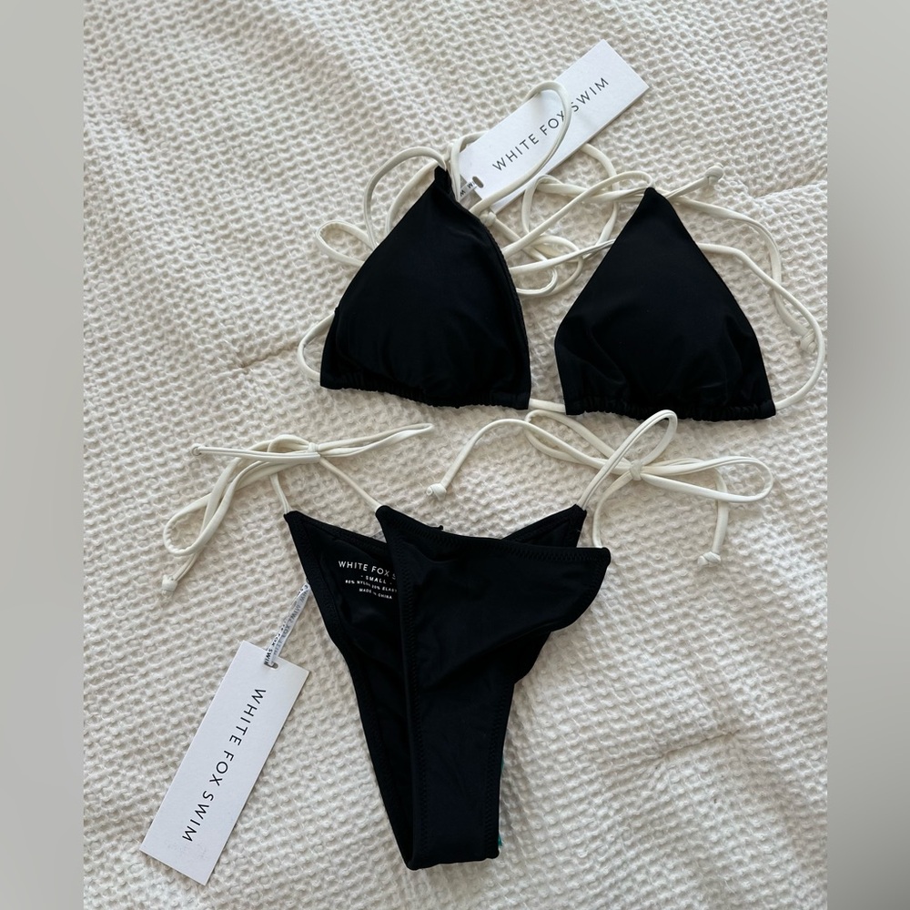 White Fox bikini new with tags. Both top and bottom size small.